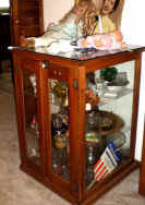 antique glass cabinet.jpg (68771 bytes)